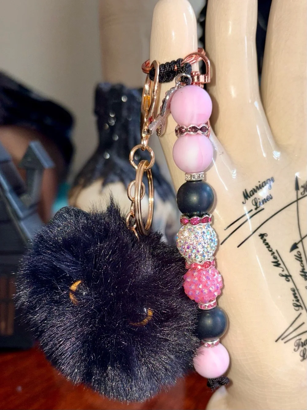 Breast cancer bag charm with black cat Pom